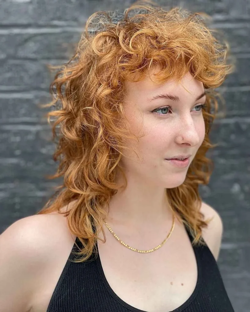 15 Wolf Cut Curly Hair Looks You’ll Love 1 Classic Curly Wolf Cut