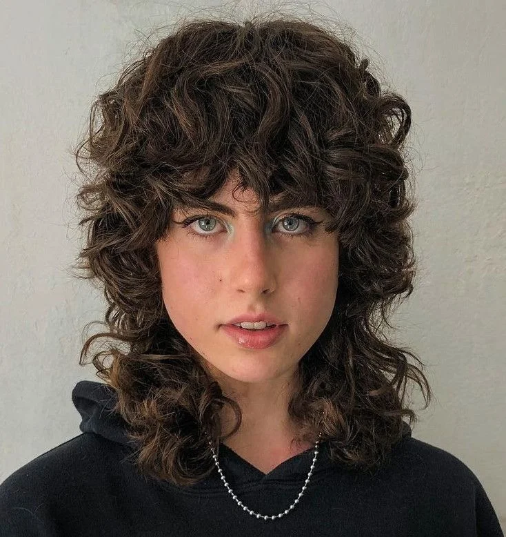 15 Wolf Cut Curly Hair Looks You’ll Love 19 Asymmetrical Curly Wolf Cut