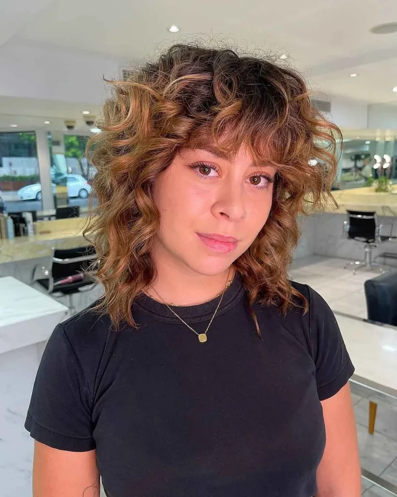 15 Wolf Cut Curly Hair Looks You’ll Love 21 Choppy Curly Wolf Cut