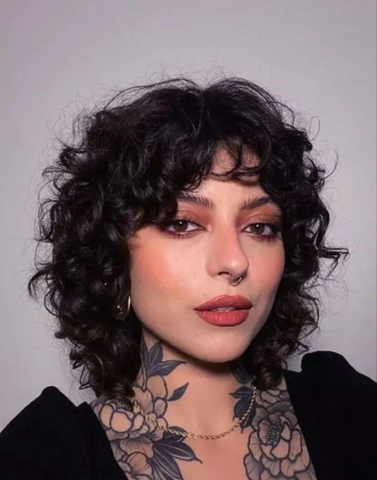 15 Wolf Cut Curly Hair Looks You’ll Love 3 Short Curly Wolf Cut