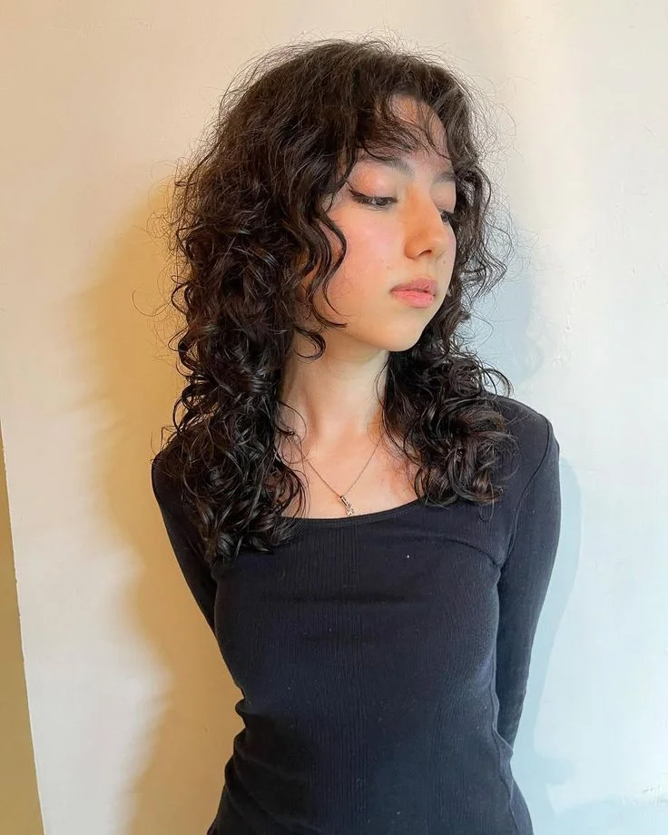 15 Wolf Cut Curly Hair Looks You’ll Love 5 Long Curly Wolf Cut
