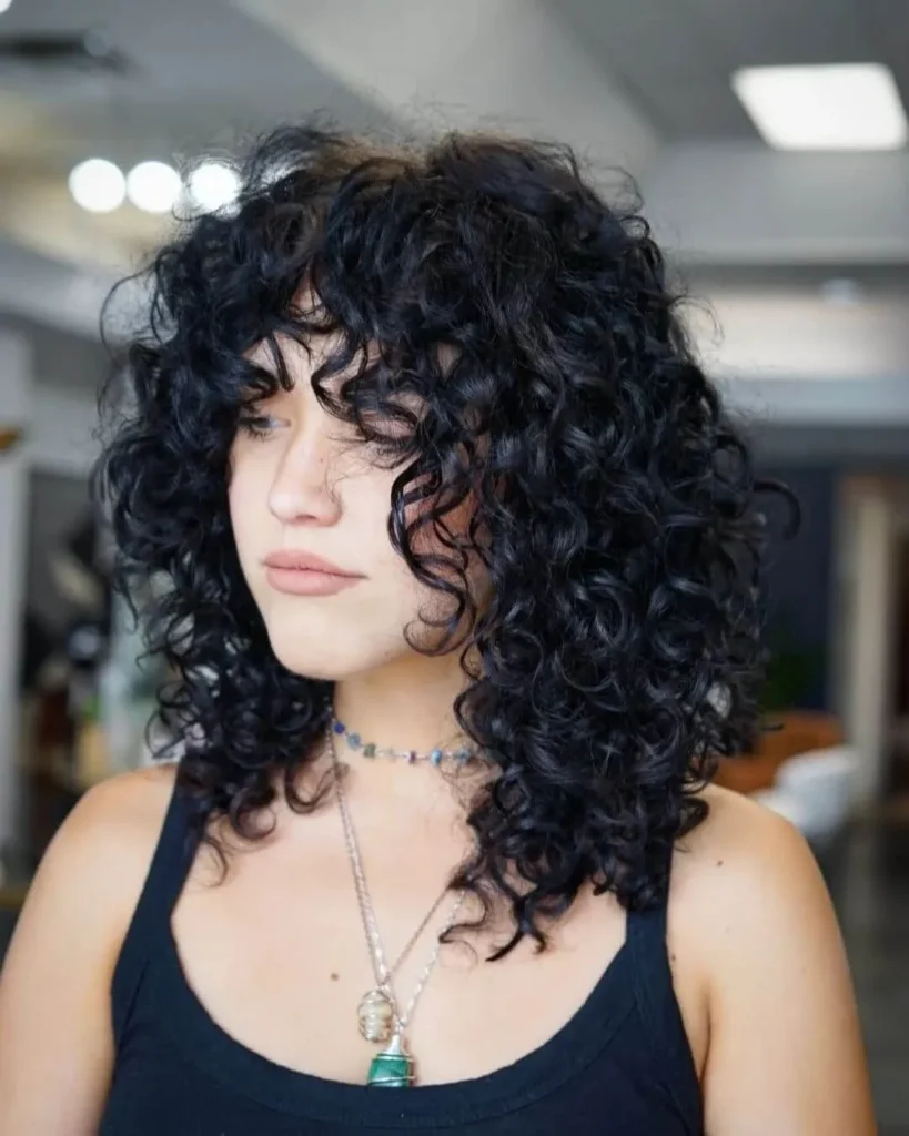 15 Wolf Cut Curly Hair Looks You’ll Love 15 Layered Curly Wolf Cut