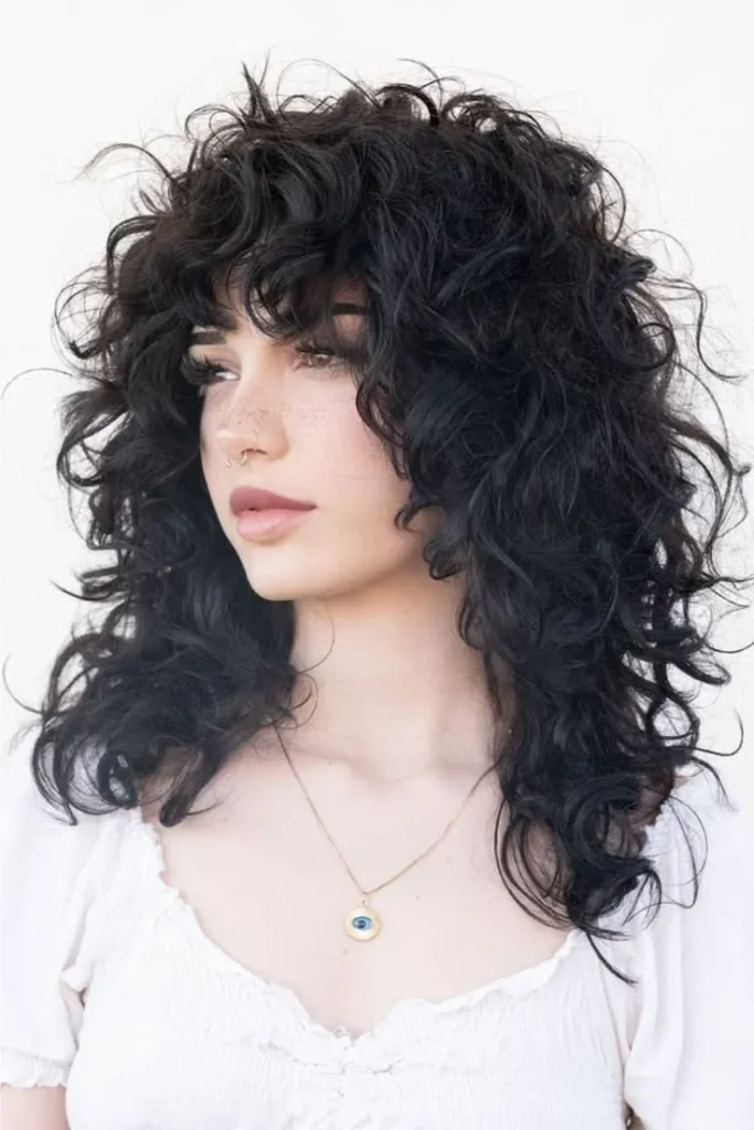 15 Wolf Cut Curly Hair Looks You’ll Love 17 Voluminous Curly Wolf Cut