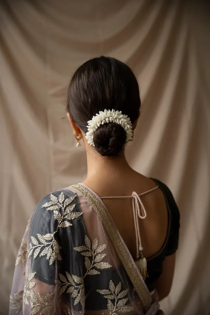 14. Sleek Hair with Gajra
