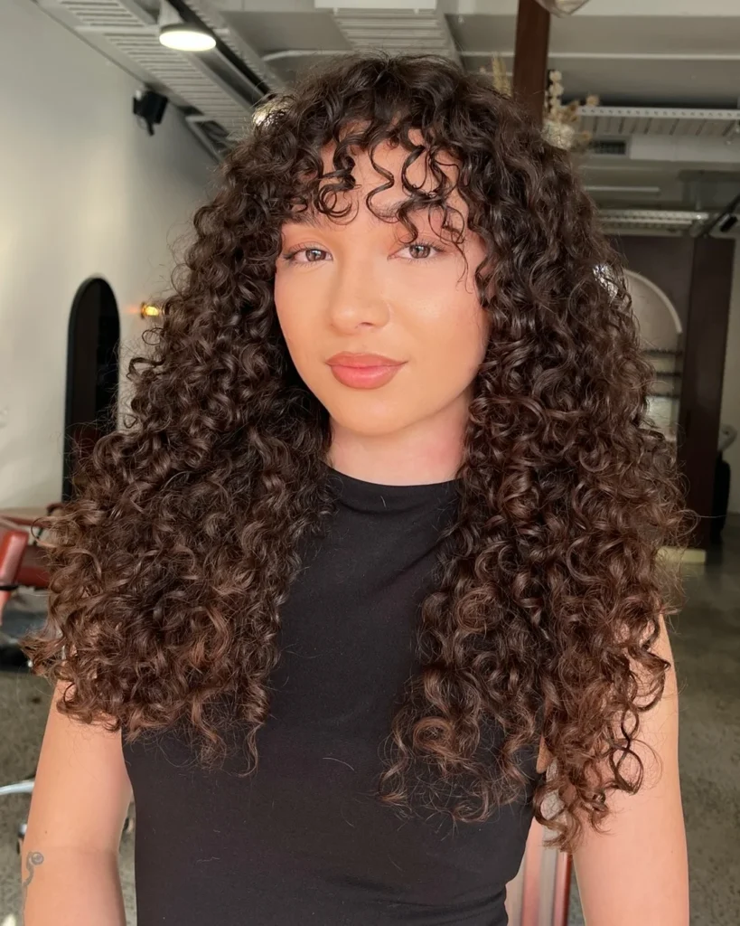 Curly with Side-Swept Fringe
