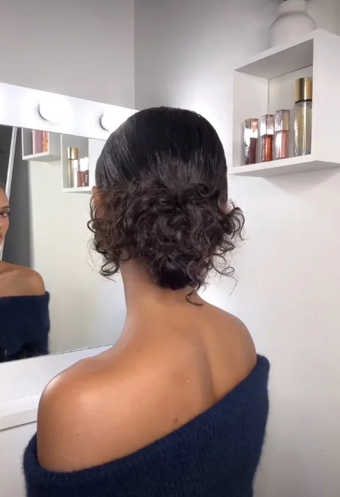 Curly Low Bun with Volume
